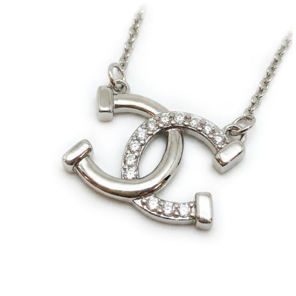 Collier pendentif - Double Fers à Cheval entrecroisés - argent massif et zircons