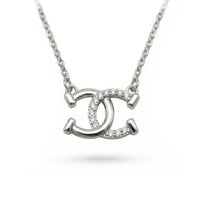 Collier pendentif - Double Fers à Cheval entrecroisés - argent massif et zircons