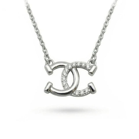 Collier pendentif - Double Fers à Cheval entrecroisés - argent massif et zircons