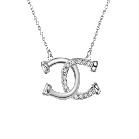 Collier pendentif - Double Fers à Cheval entrecroisés - argent massif et zircons