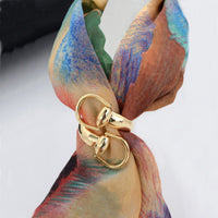 Bague anneau de foulard - motif mors en spirale