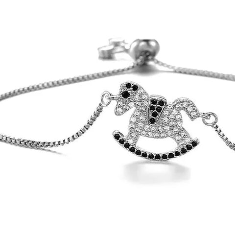 Bracelet Cheval bascule Incrusté cristaux de zircon et petit coeur