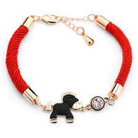 Bracelet Corde rouge, cheval onyx noir plaqué or et brillants